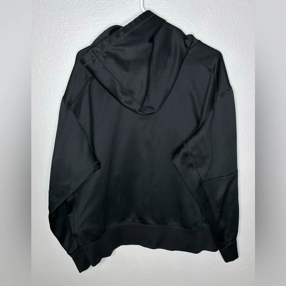 NIKE BLACK PULLOVER HOODIE WITH POCKETS FOOTBALL PRINT